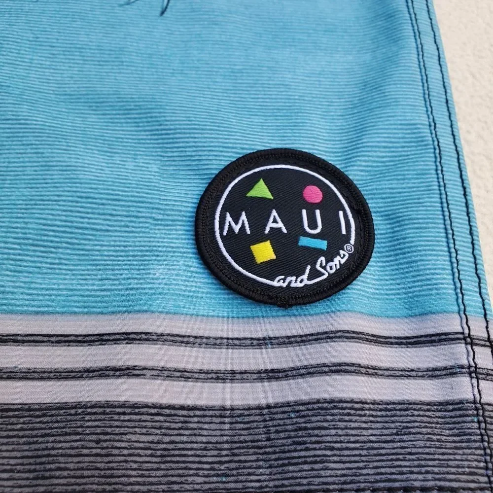 Maui and Sons blue gray and black board shorts